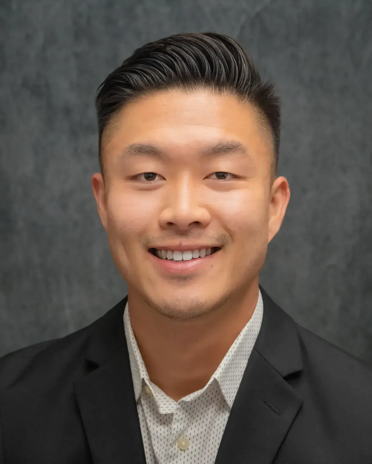 Orthopedic physician assistant at LAOSS Matt Lee smiles