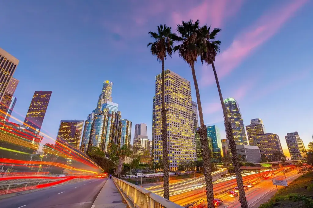 Downtown Los Angeles, California skyline and freeway at dusk