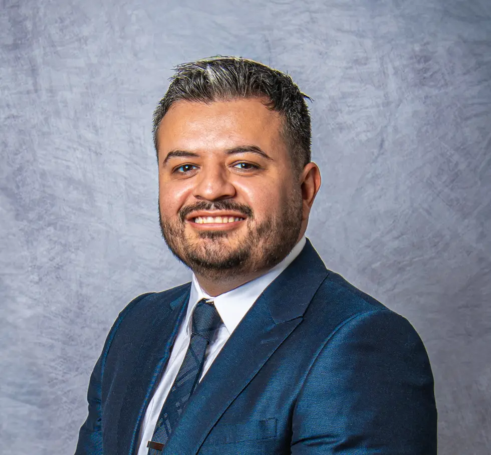 Pain medicine specialist Dr. Jose Acosta of LAOSS smiling